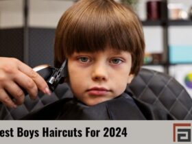 little boy sitting on barber chair having a Classic Bowl Cut