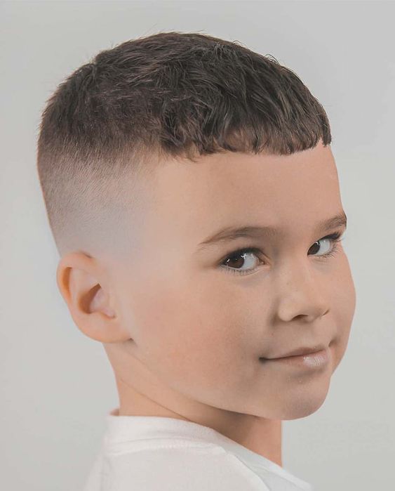 A boy having fun with Caesar Cut hairstyle